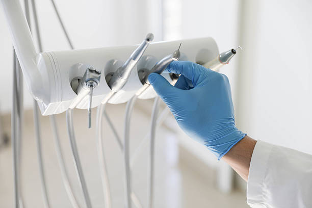 Professional Tooth Extraction technician working in Villas, NJ